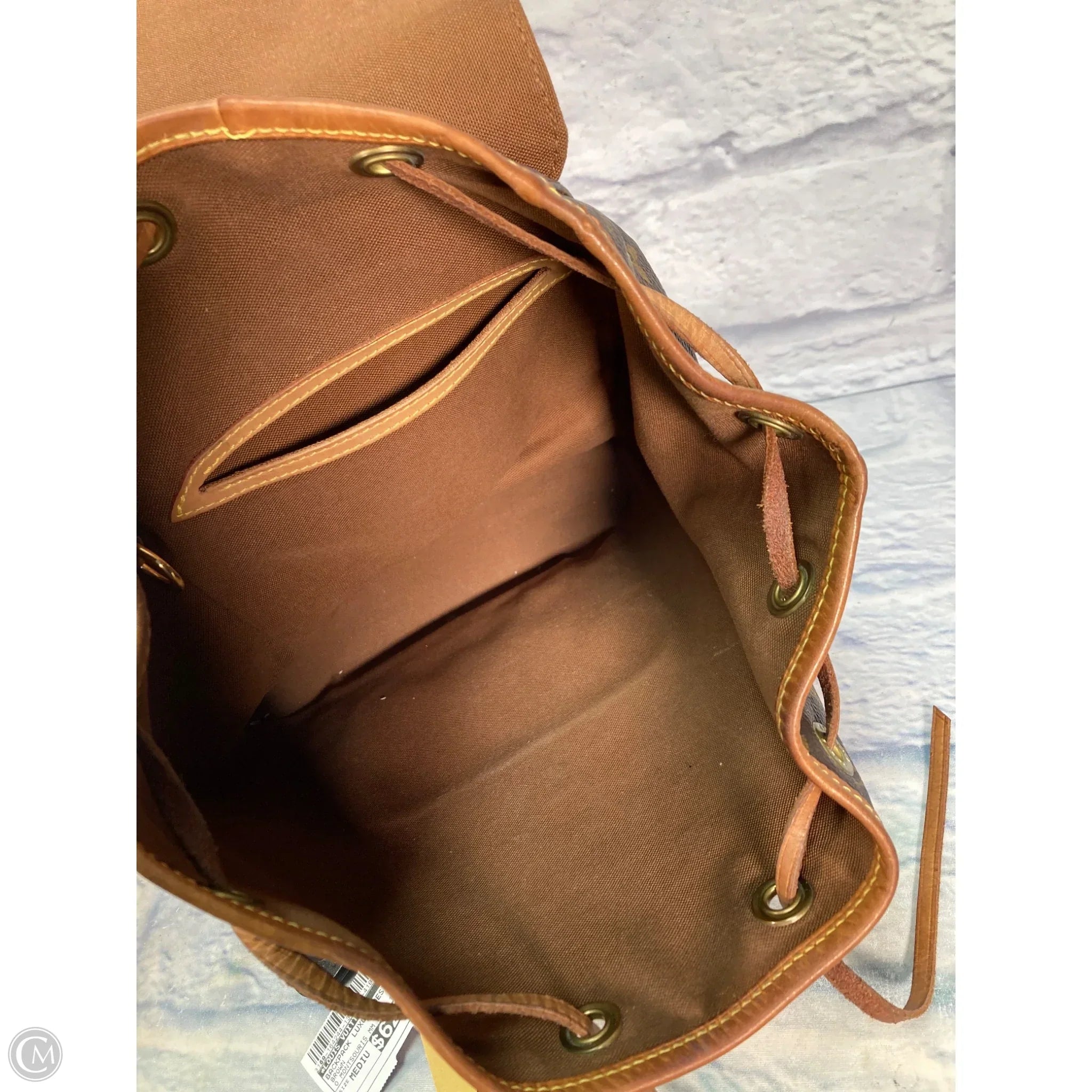 Backpack Luxury Designer By Louis Vuitton, Size: Medium